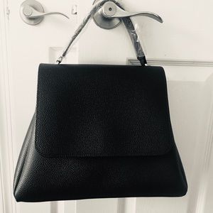 Perfect christmas gift to mom Ester Lauder  purse.